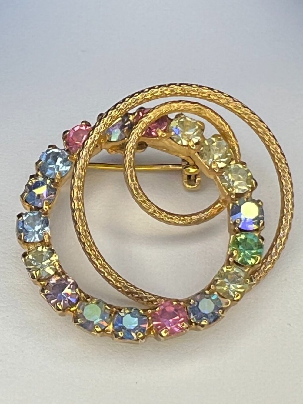 Vintage Gold Tone Rhinestone Swirl Brooch AB Crystal Mid Century Pin